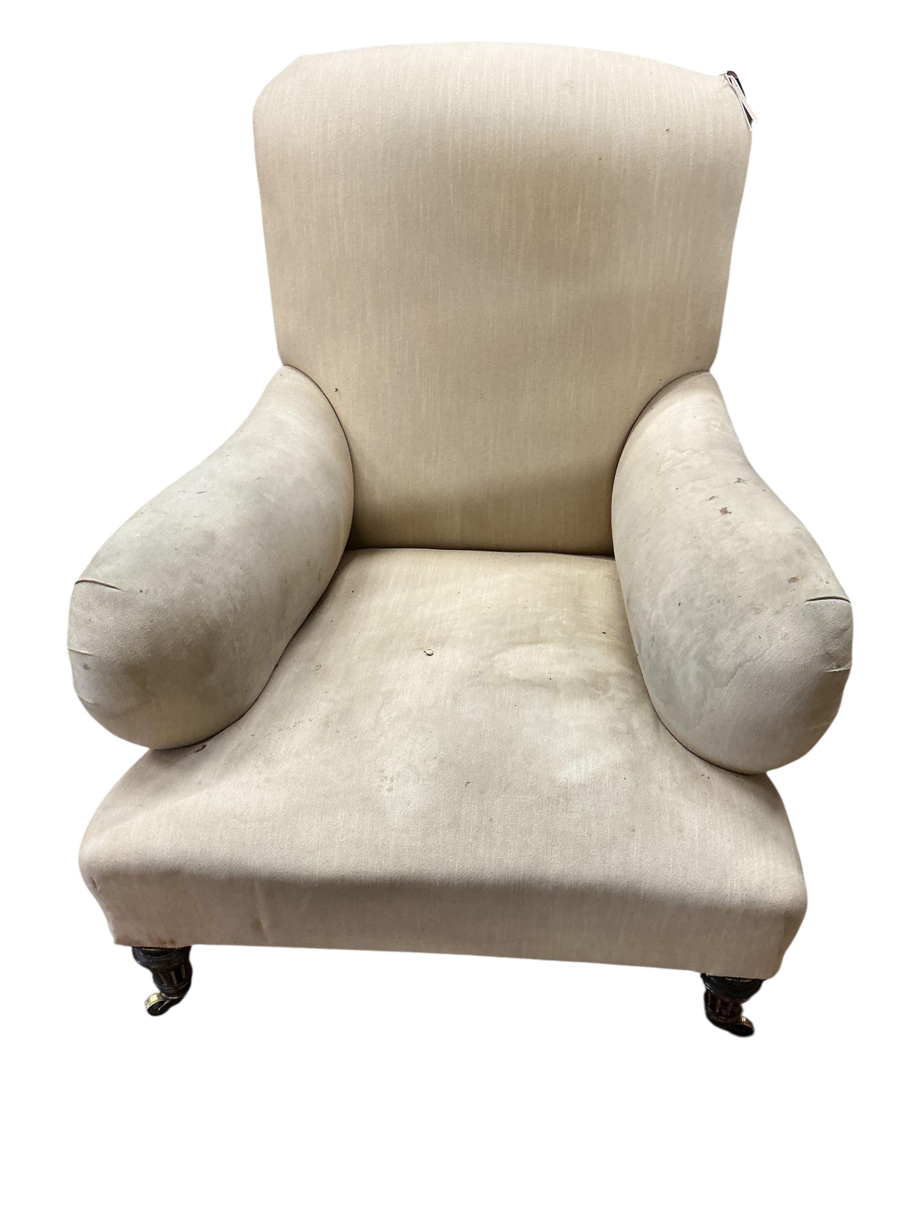 A Victorian Howard style upholstered armchair, width 80cm, depth 80cm, height 88cm